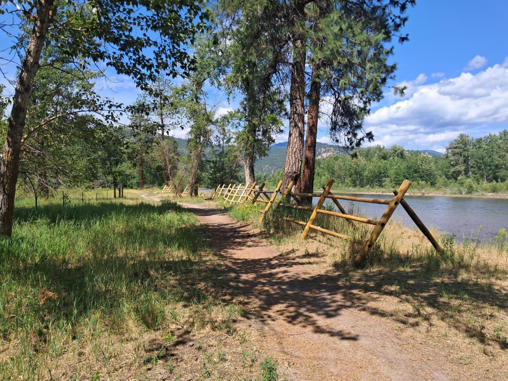 Banner (Lolo Riverside Park on a sunny day with the Bitterroot river) | Lolo split rail 