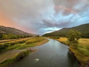 Rock Creek Confluence property with a rainbow