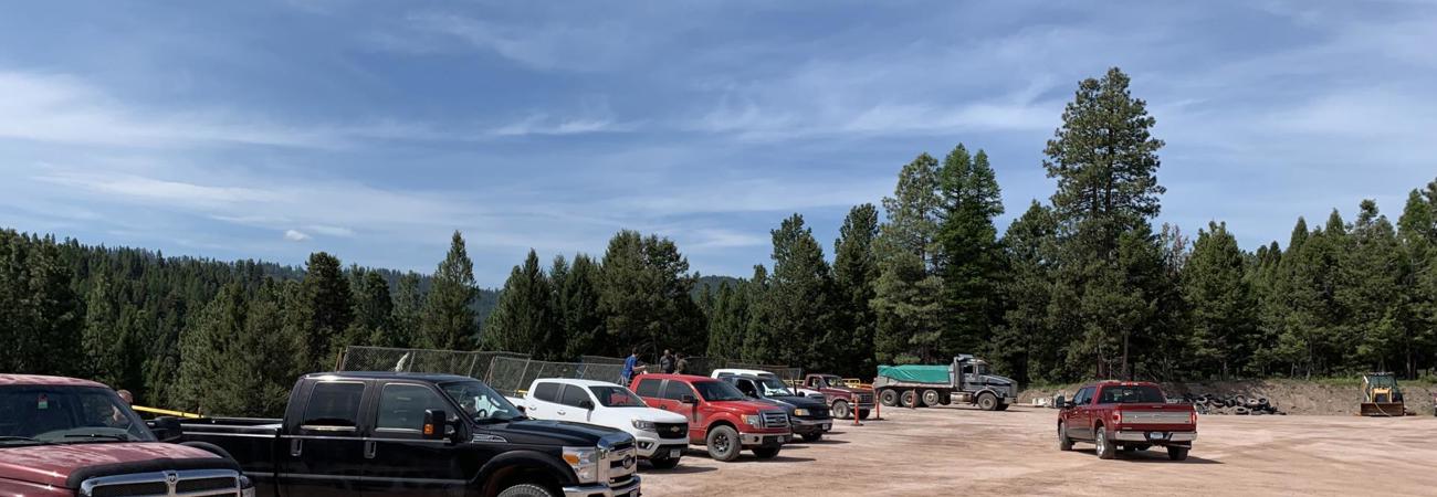 Seeley Lake Refuse District parking lot on a sunny day